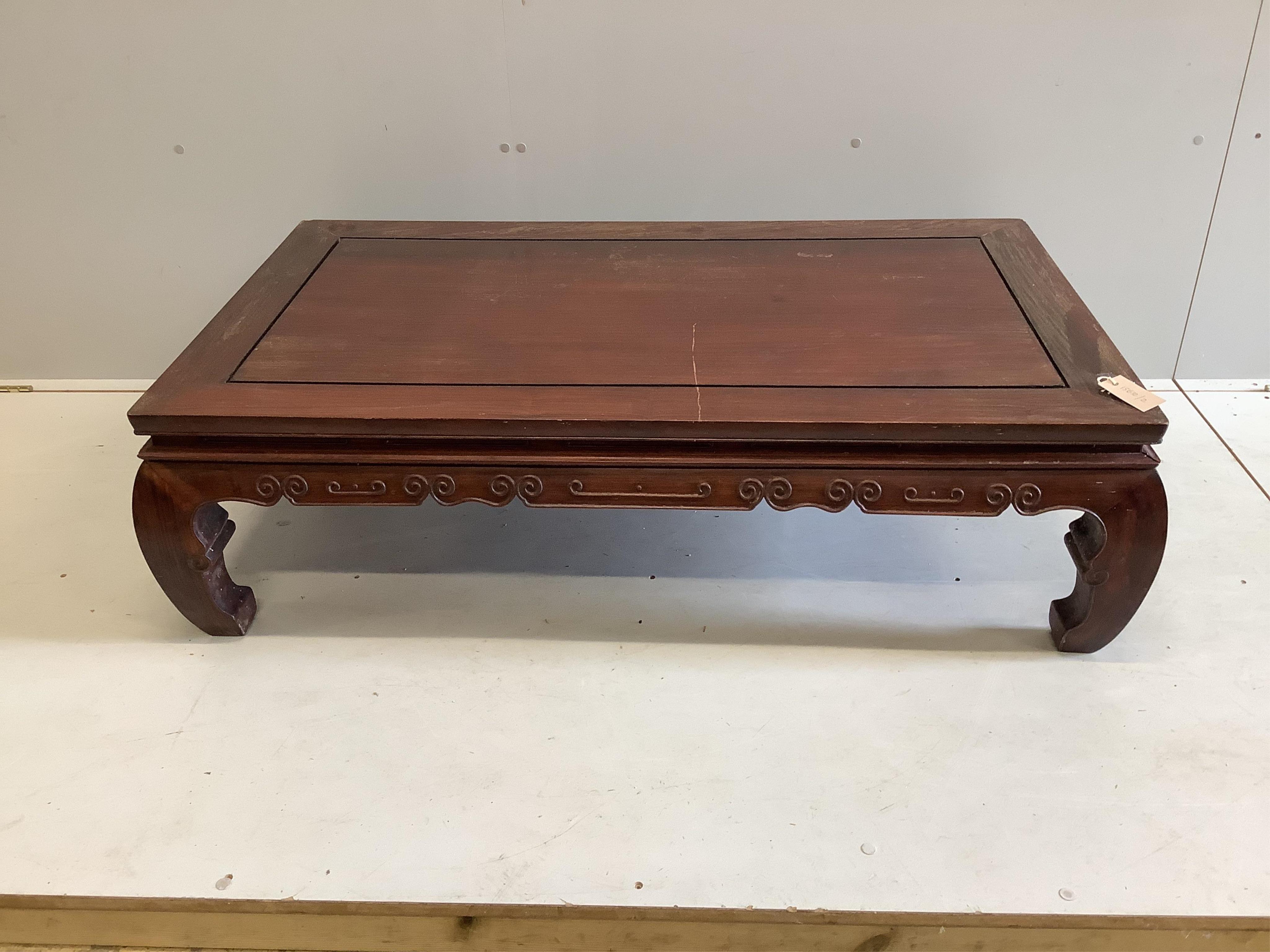 A Chinese rectangular hardwood coffee table, width 122cm, depth 72cm, height 36cm. Condition - fair